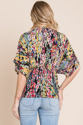 BOMBOM Women's Printed Surplice Peplum Blouse - Trendy & Versatile